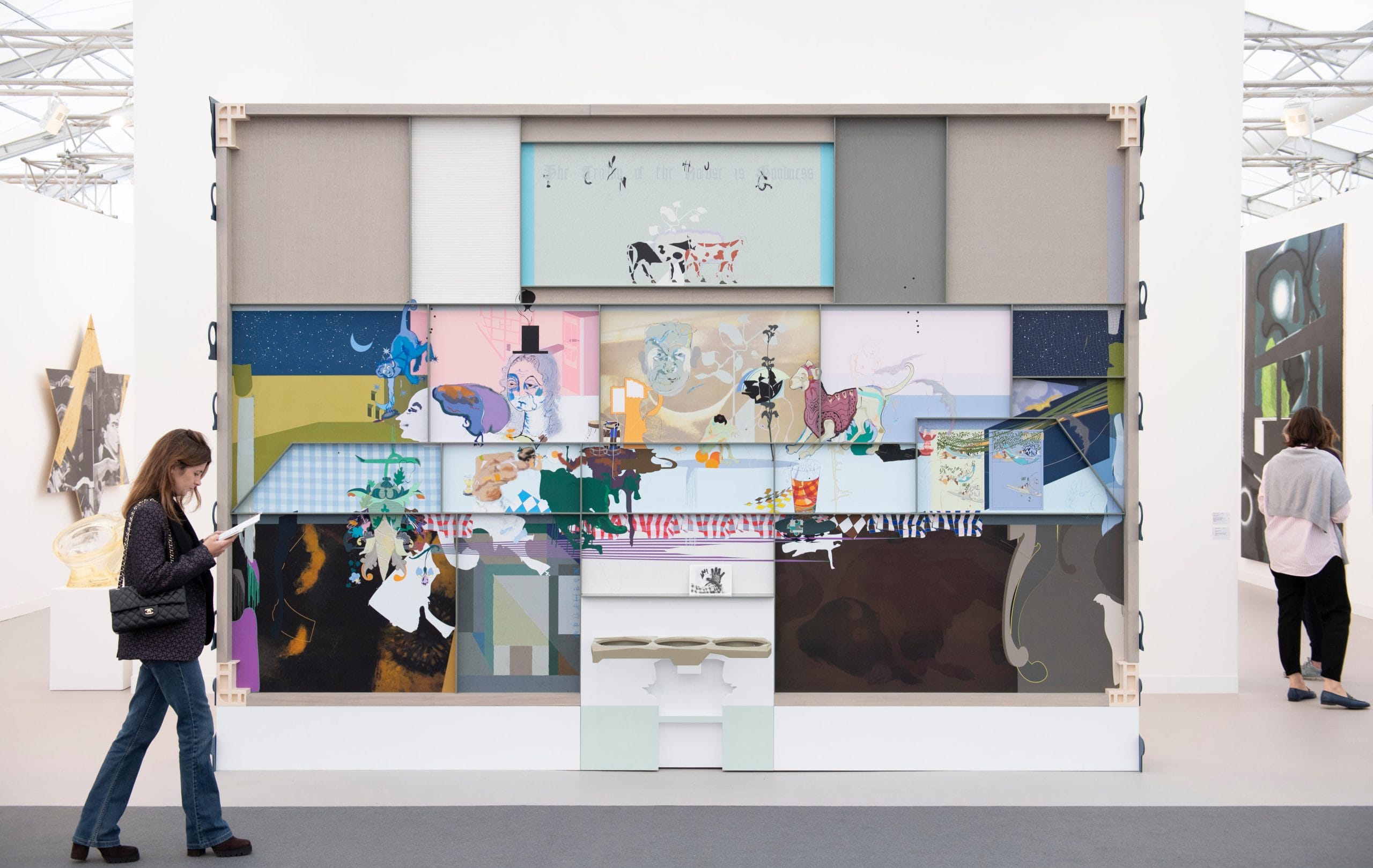 Image: Patron in front of art installation at Frieze Art Fair, Regent's Park, London, 4th October 2019